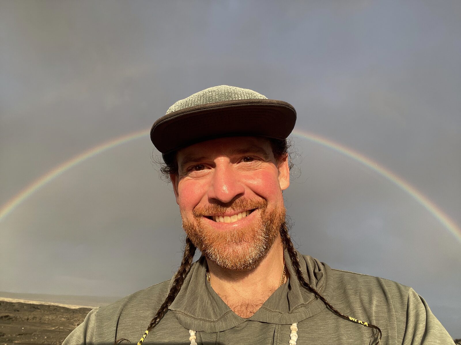Portrait under a full rainbow on the Big Island of Hawaiʻi
