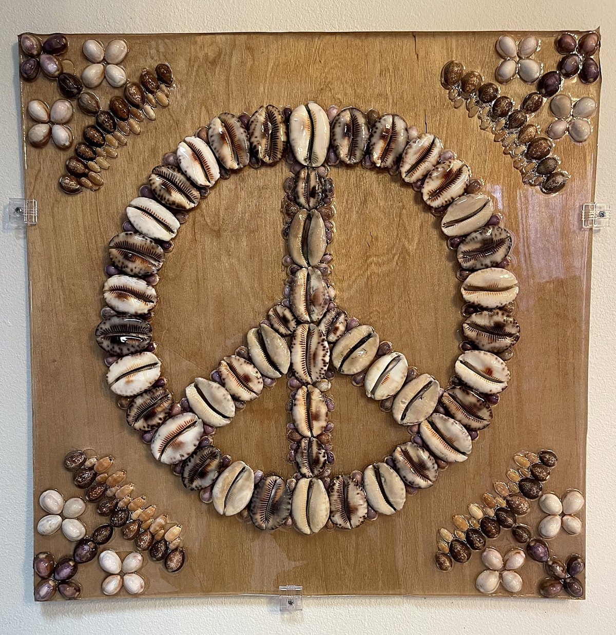 Peace — handmade Hawaiian shell mosaic wall art by Aaron Pomerantz, cowrie shells on panel
