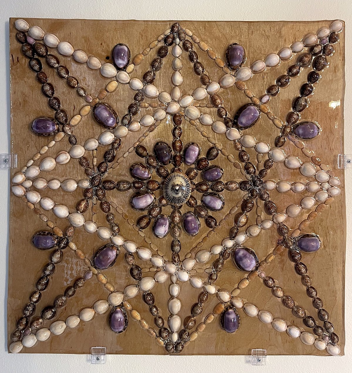 Merkaba Star — handmade Hawaiian shell mosaic wall art by Aaron Pomerantz, cowrie shells on panel